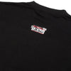 Camiseta oversized preta vista de trás, detalhe gráfico centralizado com "Chorão".