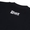 Parte de trás da camisa oversized preta com logo QIX em preto e escrita "Chorão eterno". Tudo abaixo da gola.