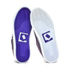 Solas do tênis uva qix, uma roxa com detalhe de logo em branco e outra branca com detalhe roxo.